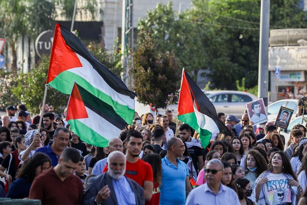 עדאלה פנה למשטרה בדרישה כי תשיב לאזרחית דגל פלסטין ומכשיר סלולרי